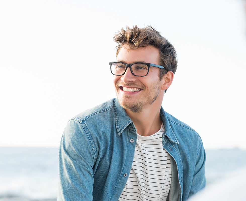 man in eyeglasses smiling