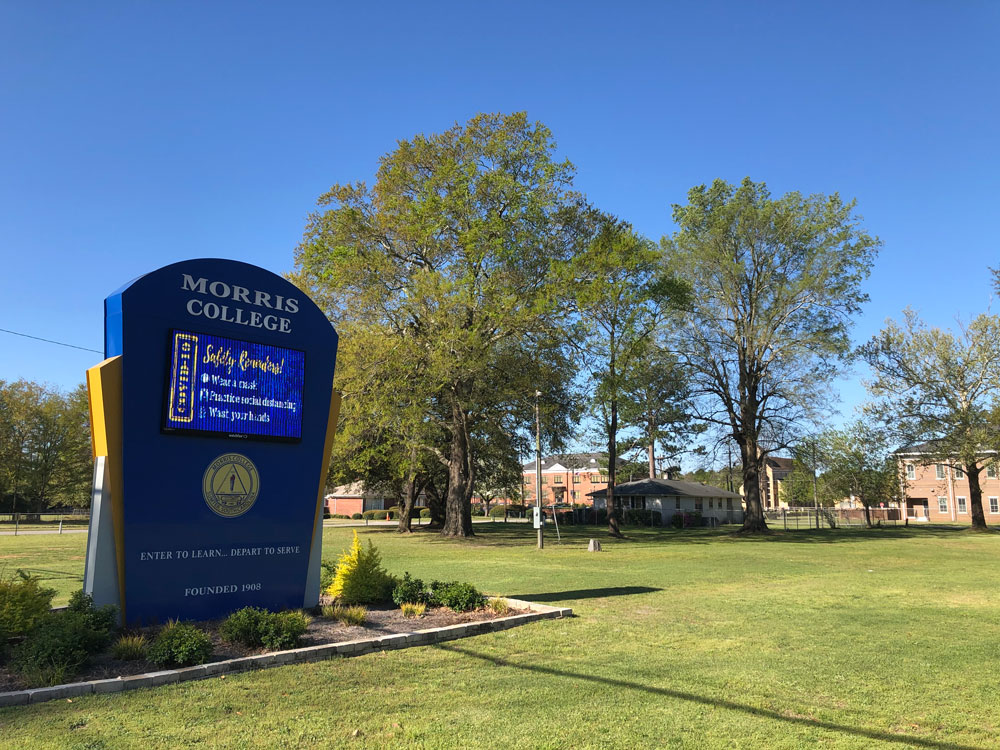 morris college entrance sign with trees and lawn in background