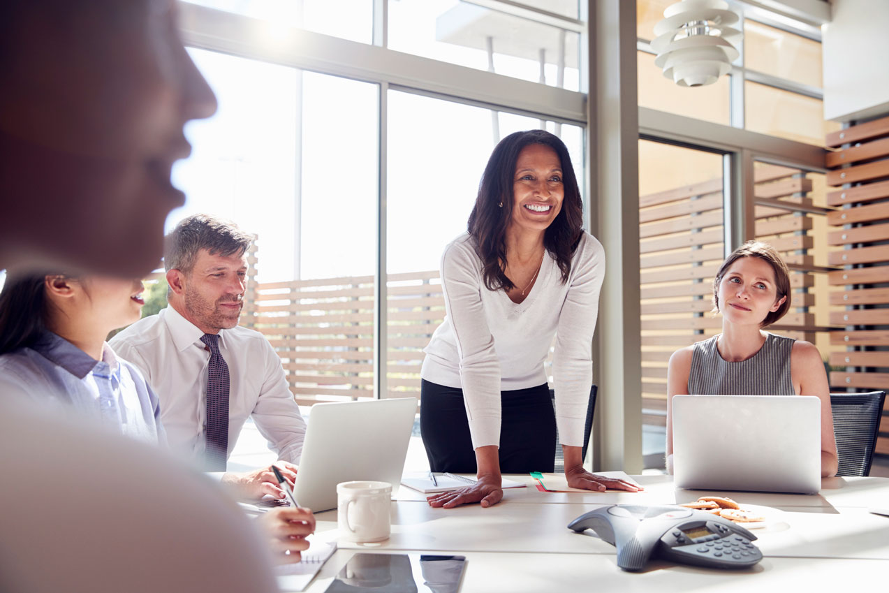 Colleagues around a boardroom table