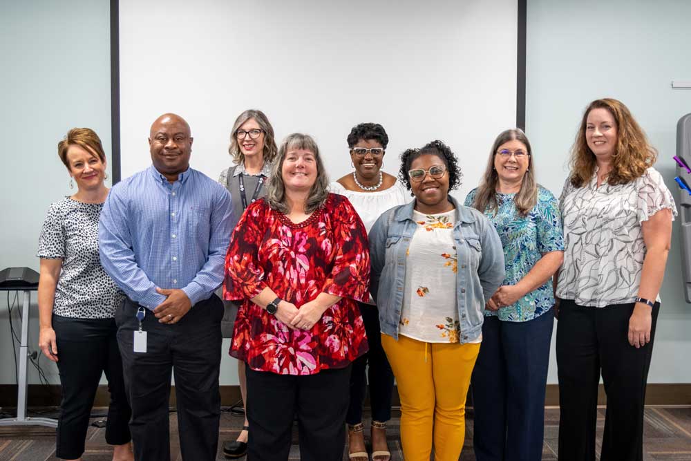employees standing together 