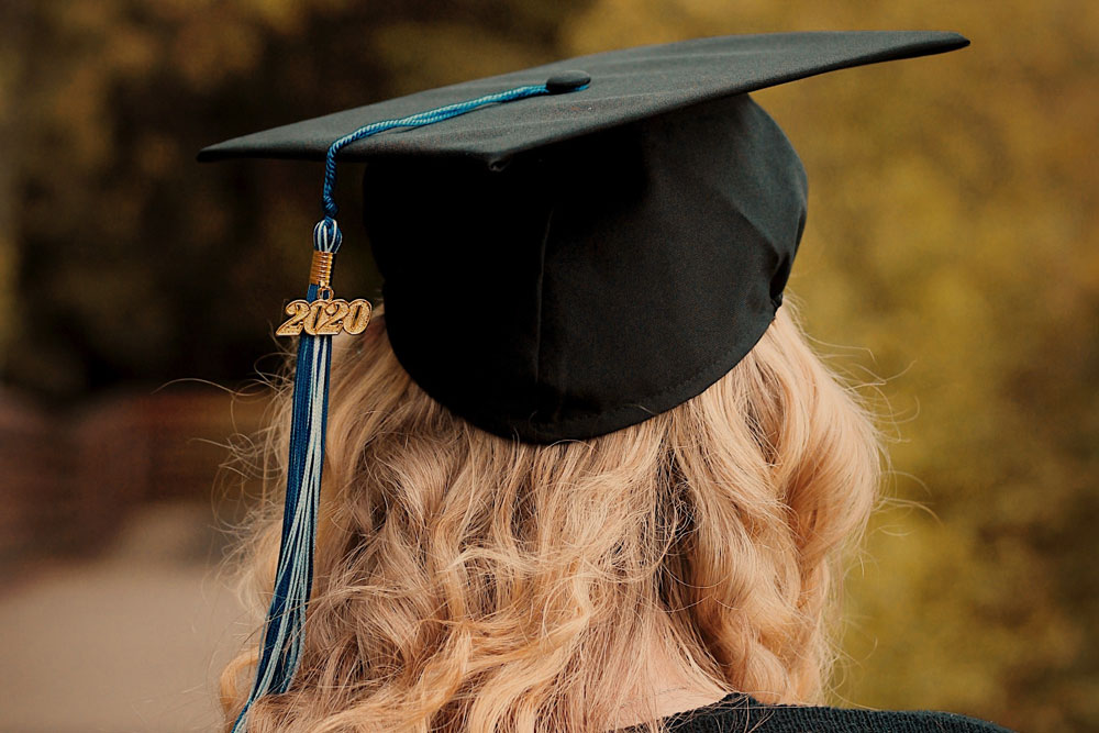 2020 graduate in cap and gown