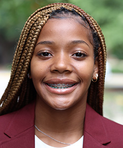 Siri Davis, a young female student at Claflin University, smiles into the camera.