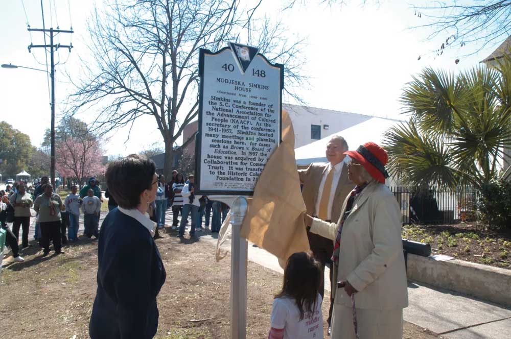 historic marker for modjeska simkins unveiled with group of people watching