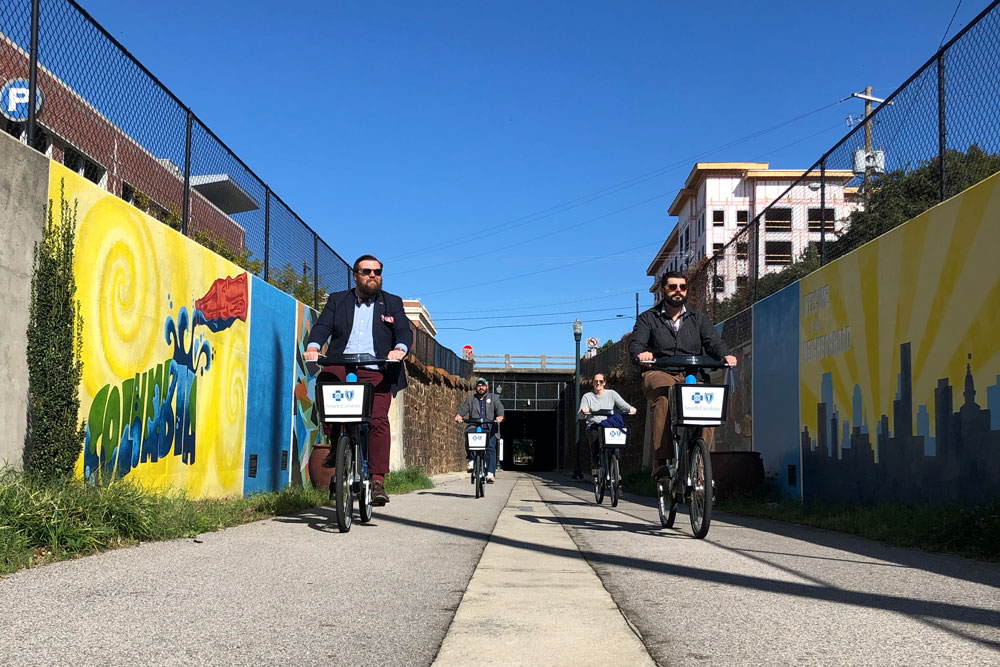 group riding Blue Bike through Columbia