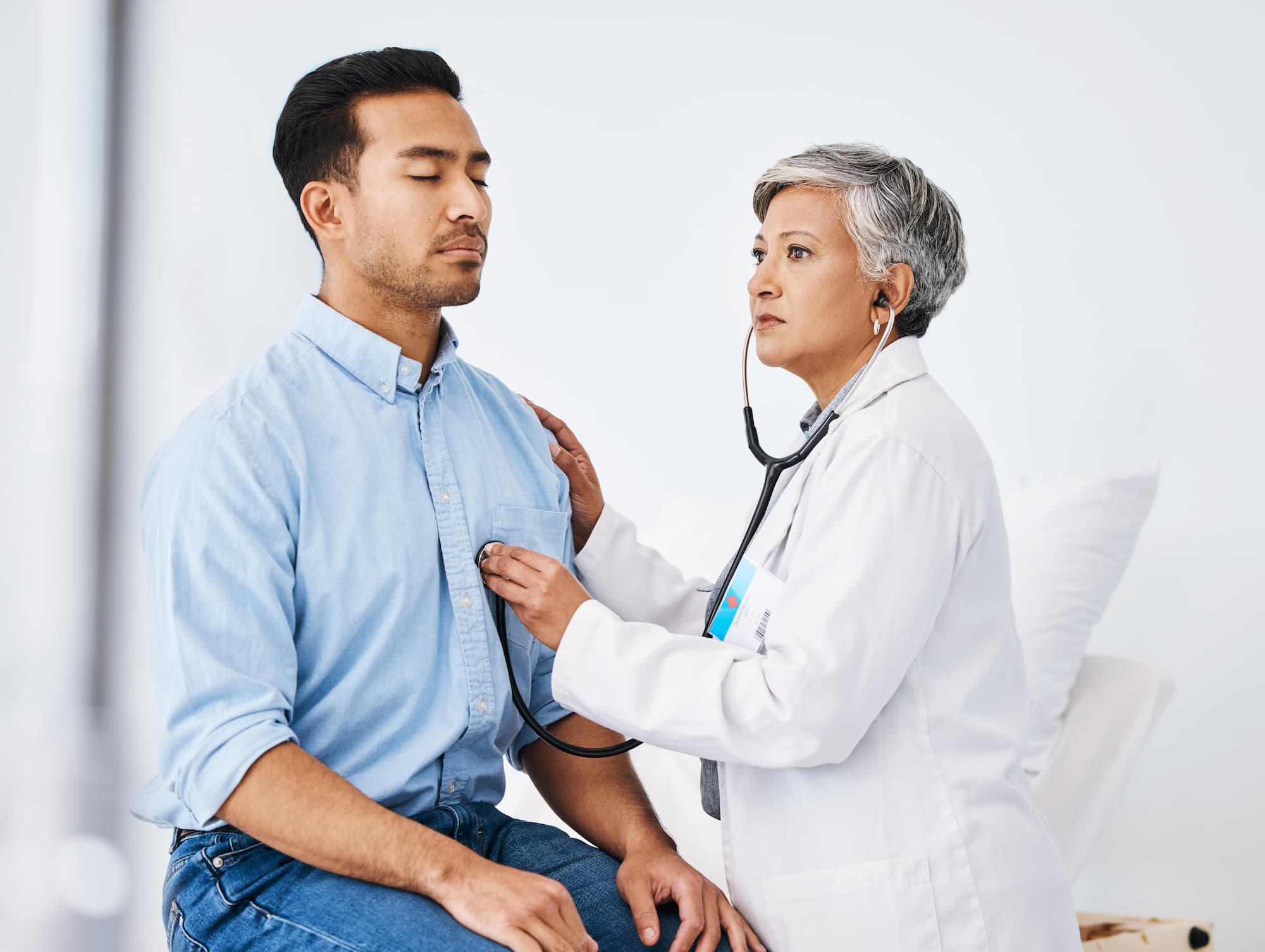 Patient and doctor with stethoscope