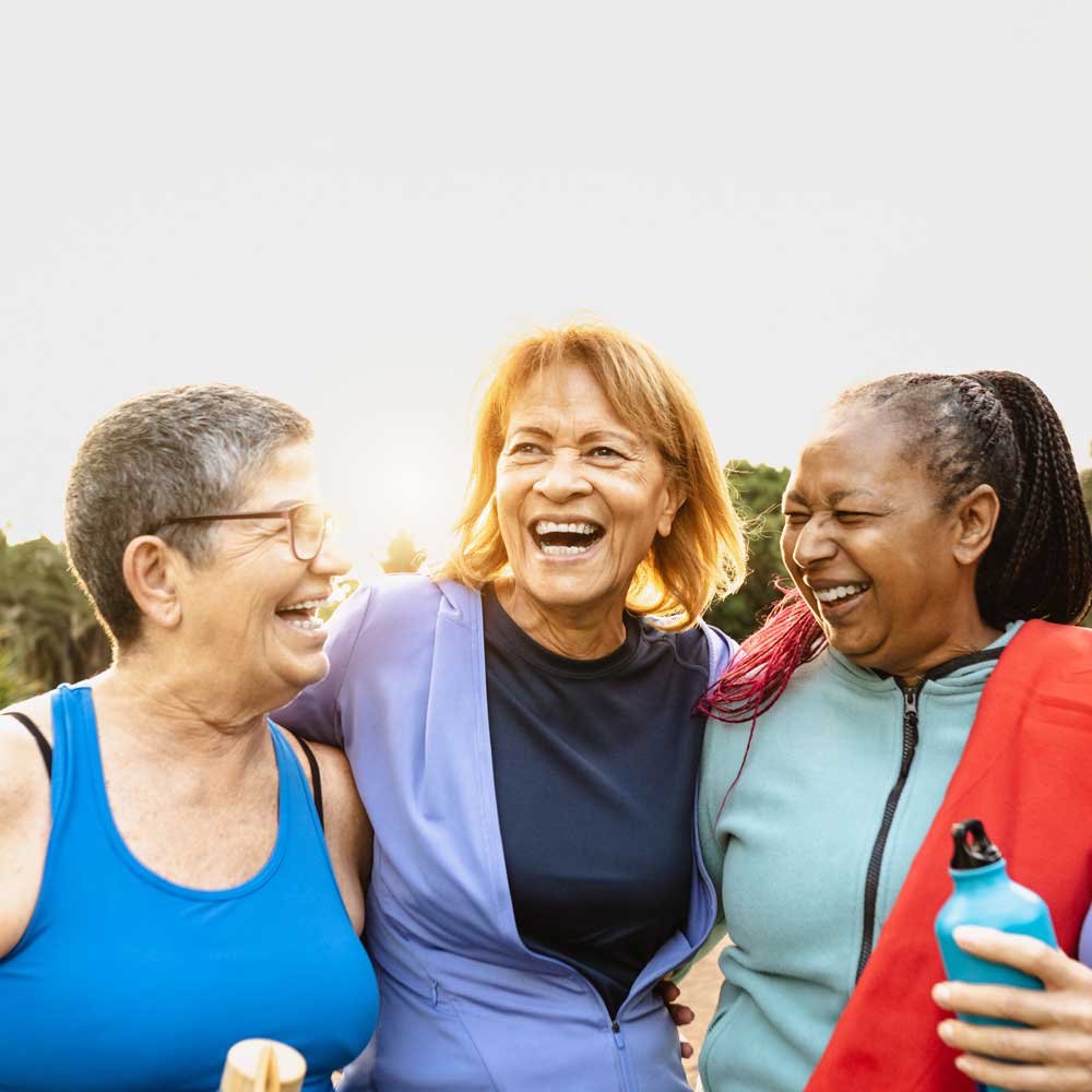 group of senior women smiling 