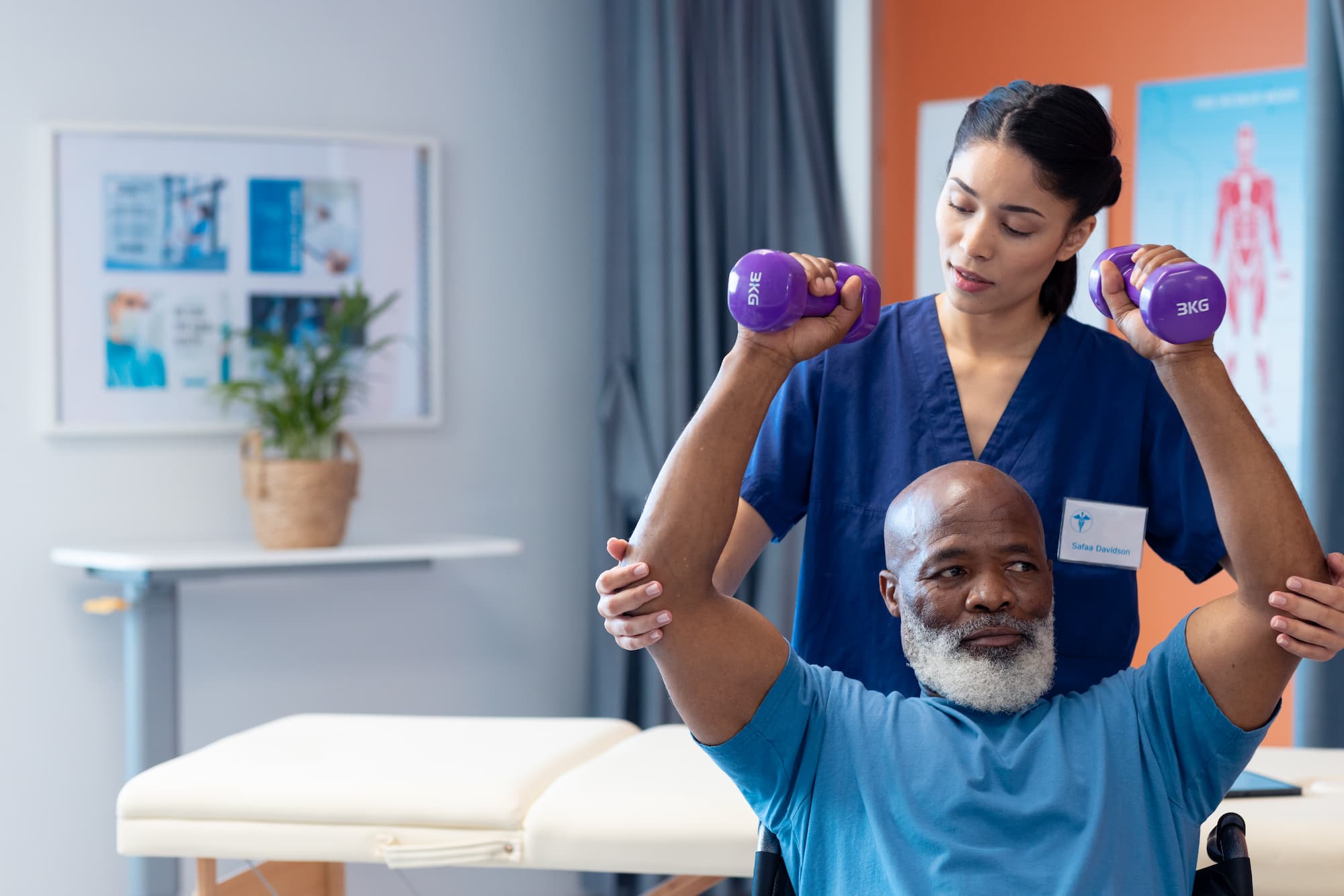 Physical therapist working with patient